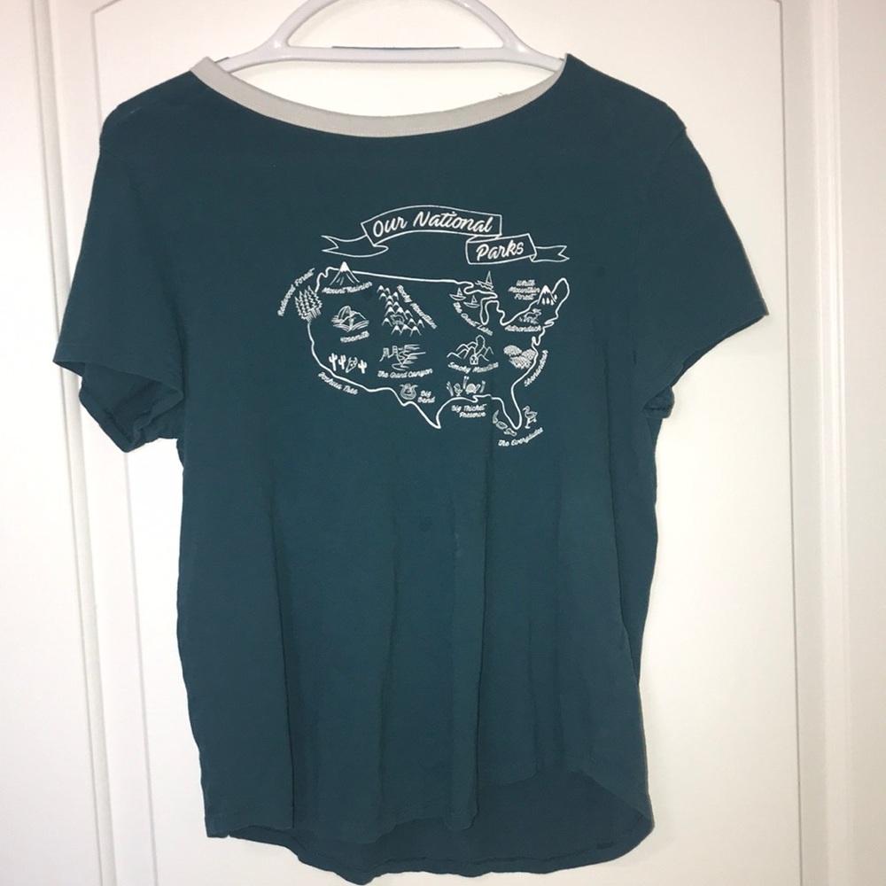 turquoise national parks shirt with a super mild stain